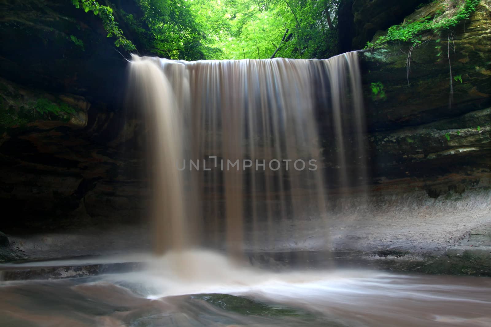 Spring rains create a beautiful scene at Lasalle Falls of Starved Rock State Park in central Illinois.