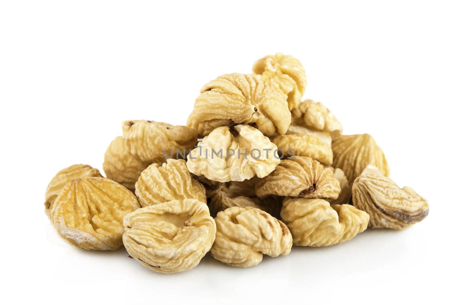 Dried chestnuts on white background