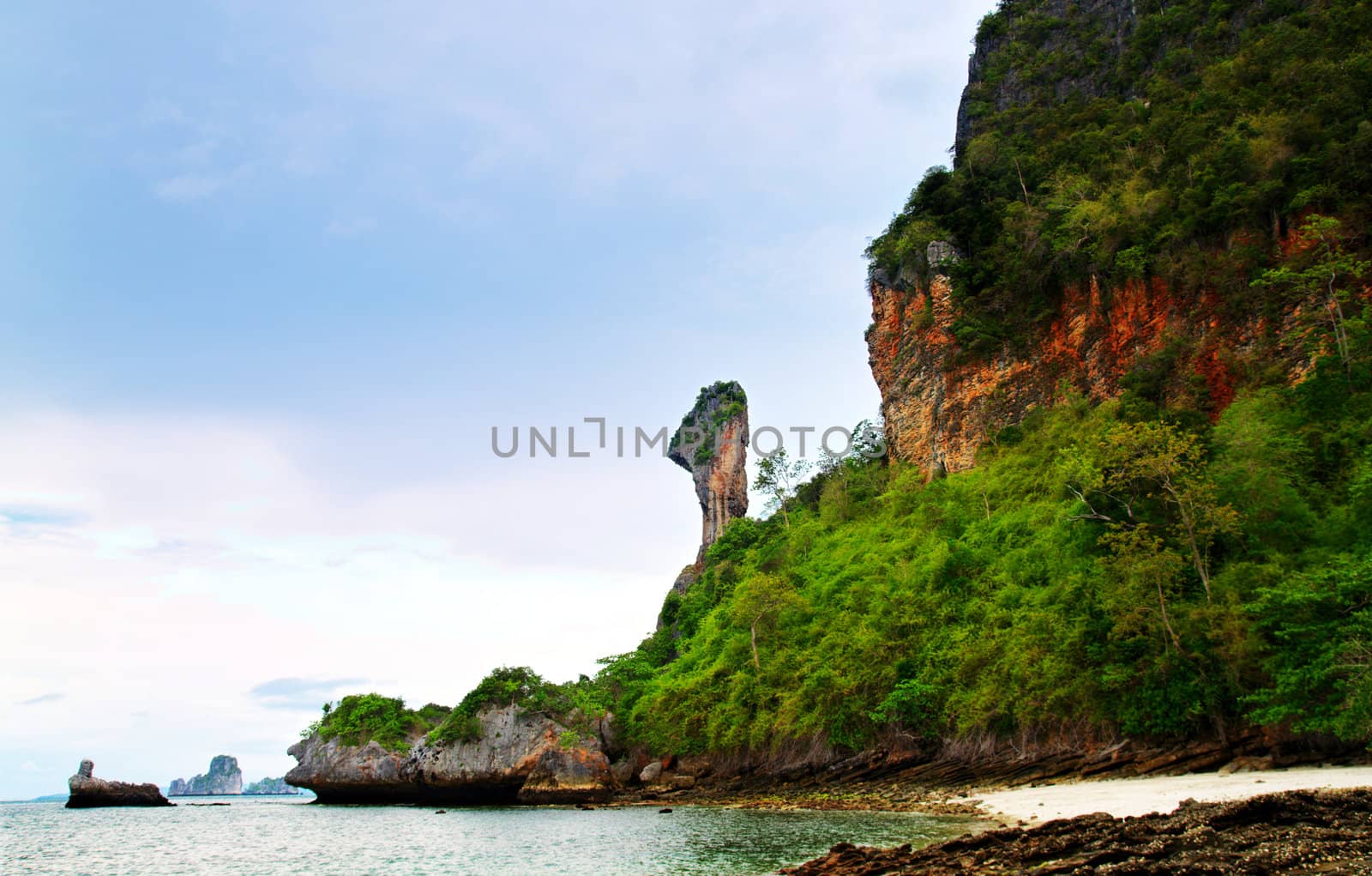 High cliffs on the tropical island. Exotic tropical landscape.