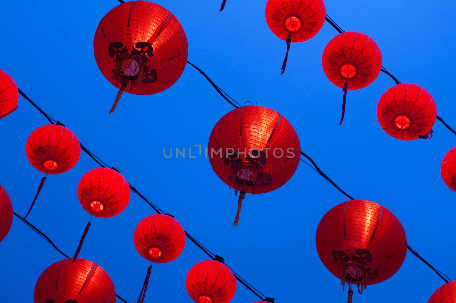 Red lanterns display at Buddhism temple. Red is lucky colour for Chinese.