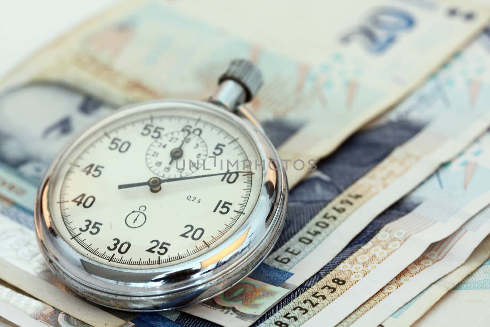 Chronometer and Bulgarian currency close up, shallow dof