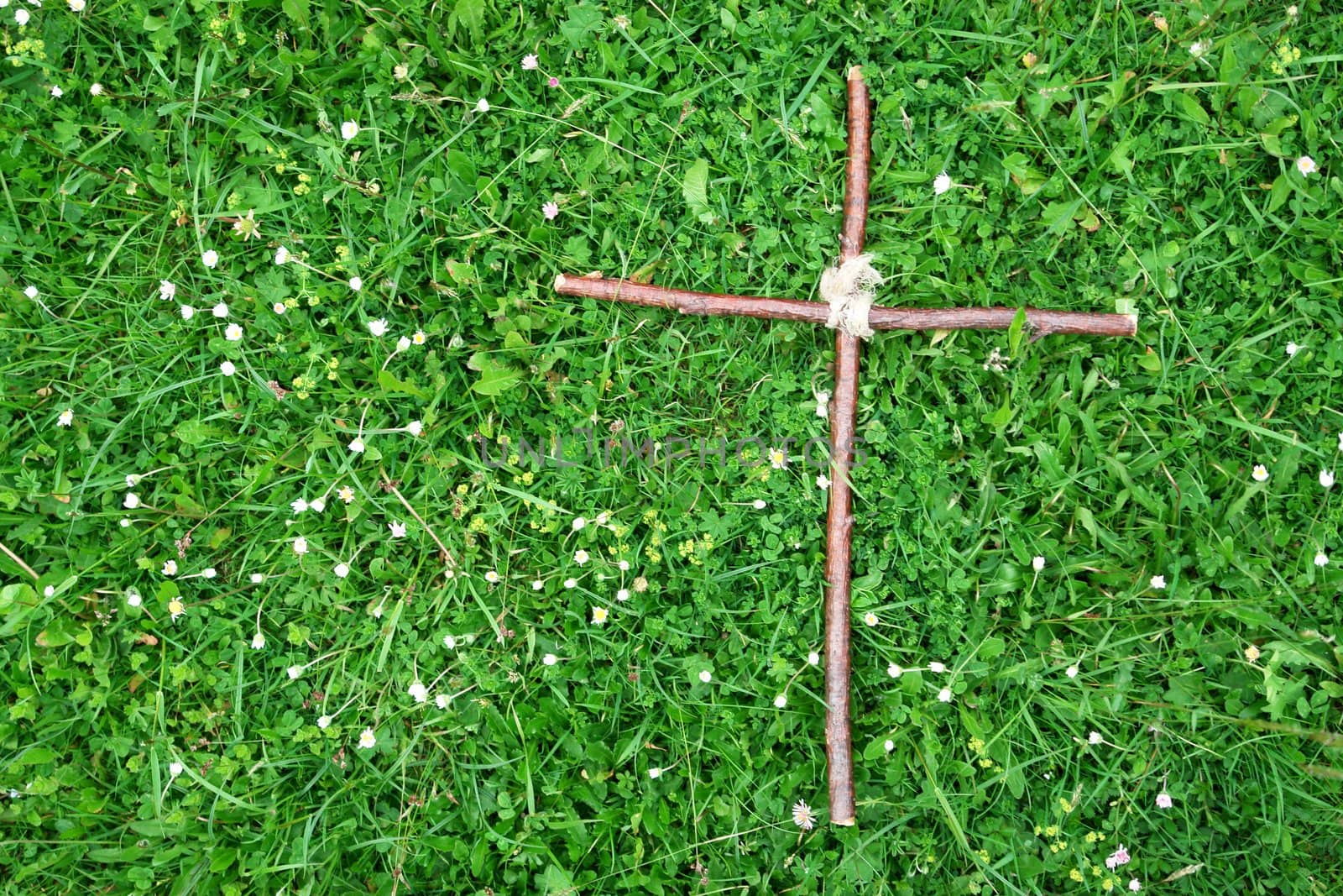 Close-up of a cross on grass