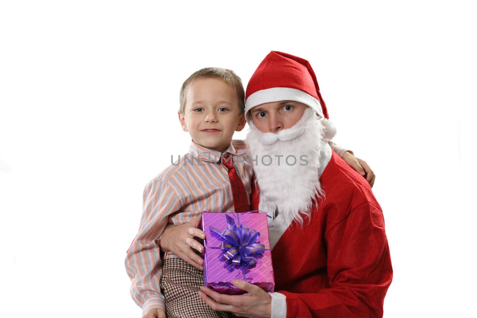 Santa together with the little boy and a gift on a white background