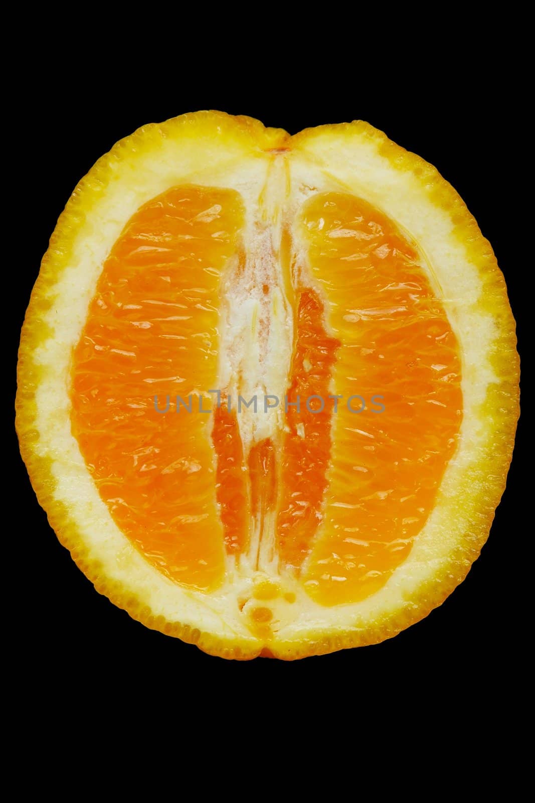 Half of juicy orange against the black background