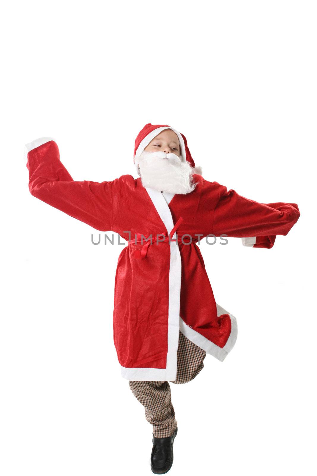 The boy in suit Santa jumps on a white background