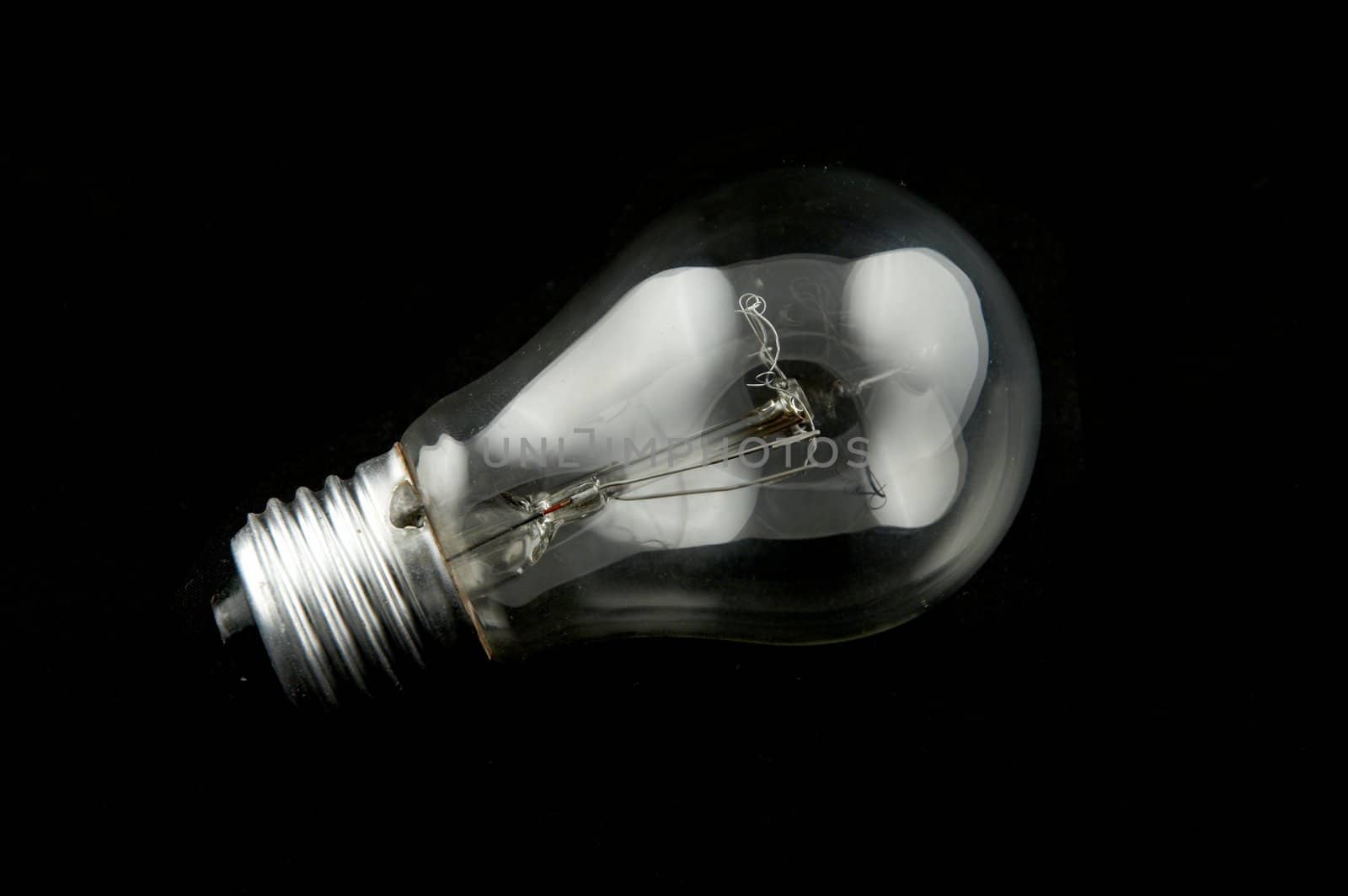 Electric lamp on a black background