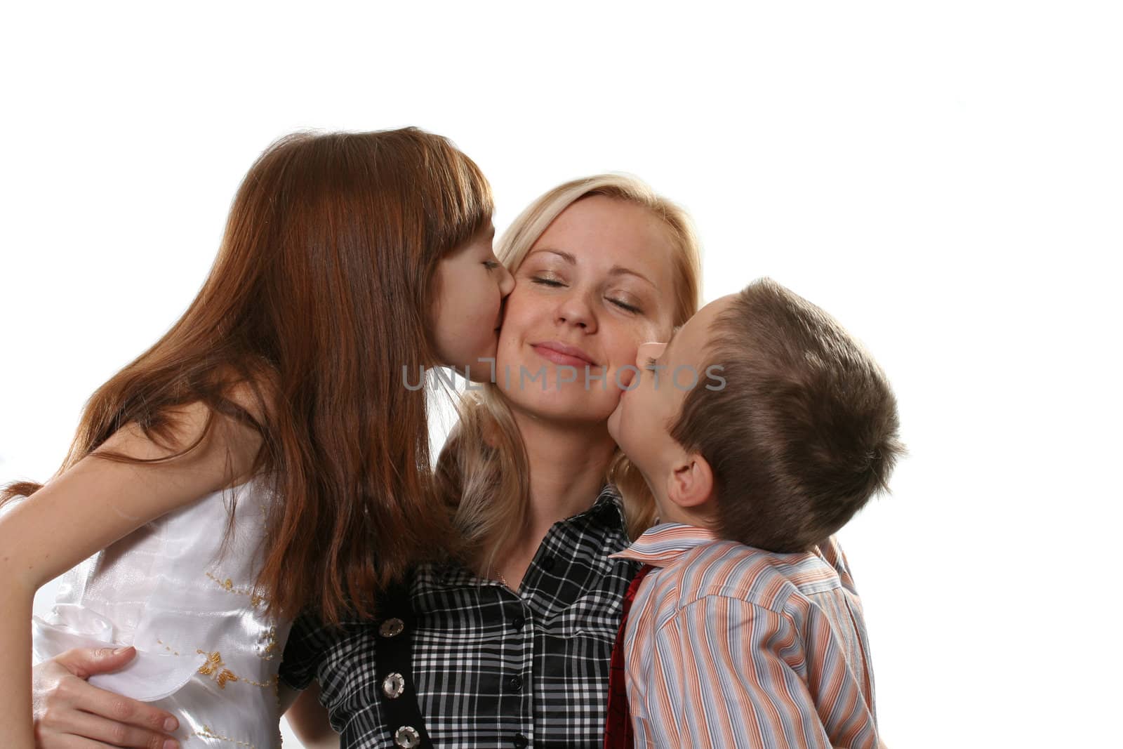 Children kiss happy young mum on a white background