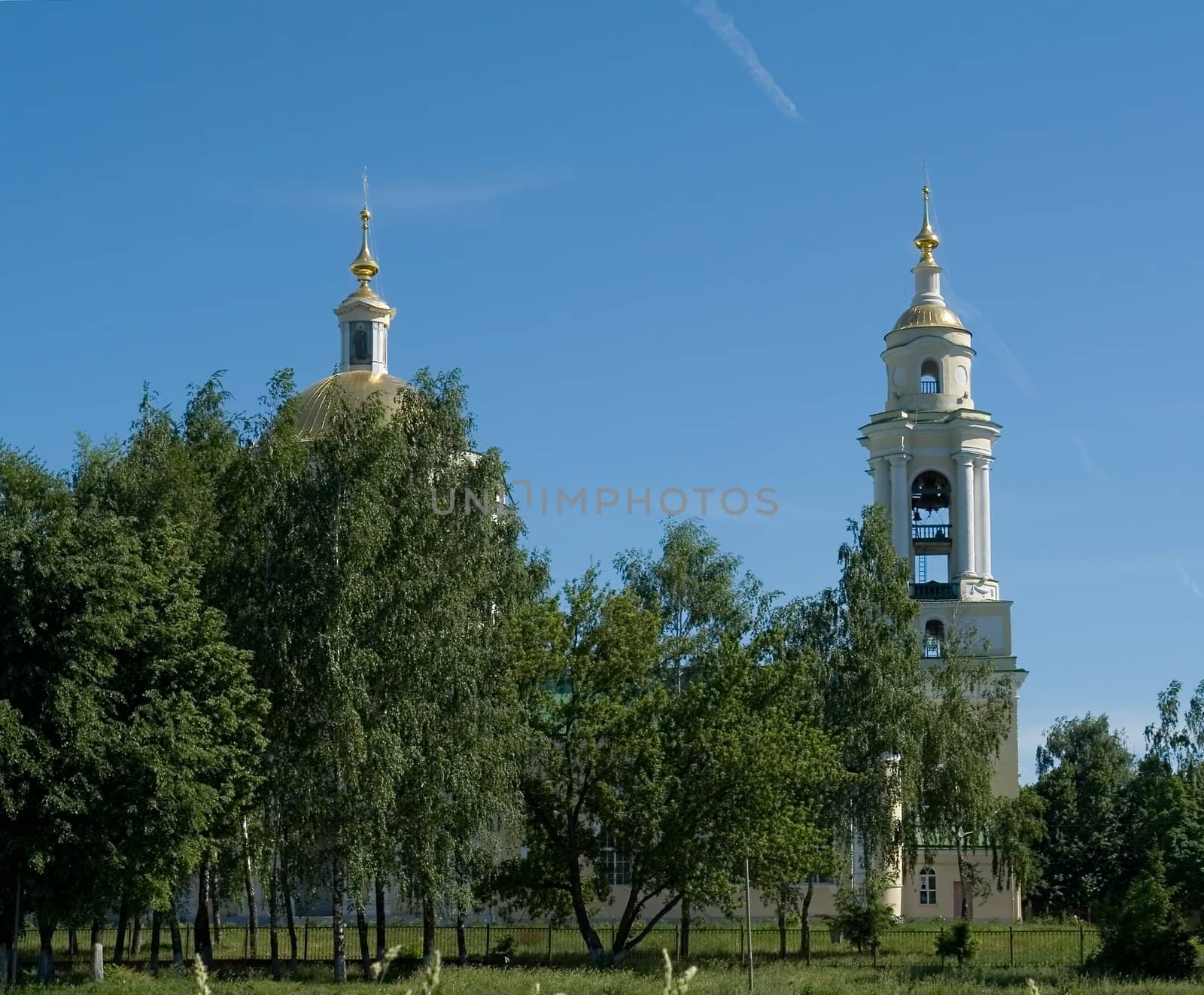 Domes of orthodox temple with blue sky at background