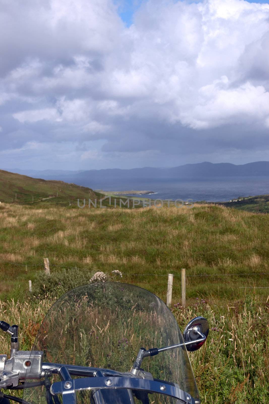 a stunning island view from a parked motorcycle