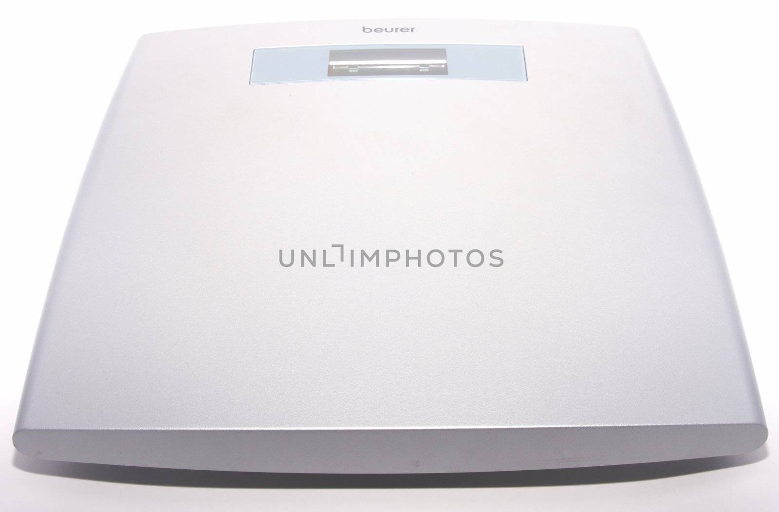 Weighing scales on white background.