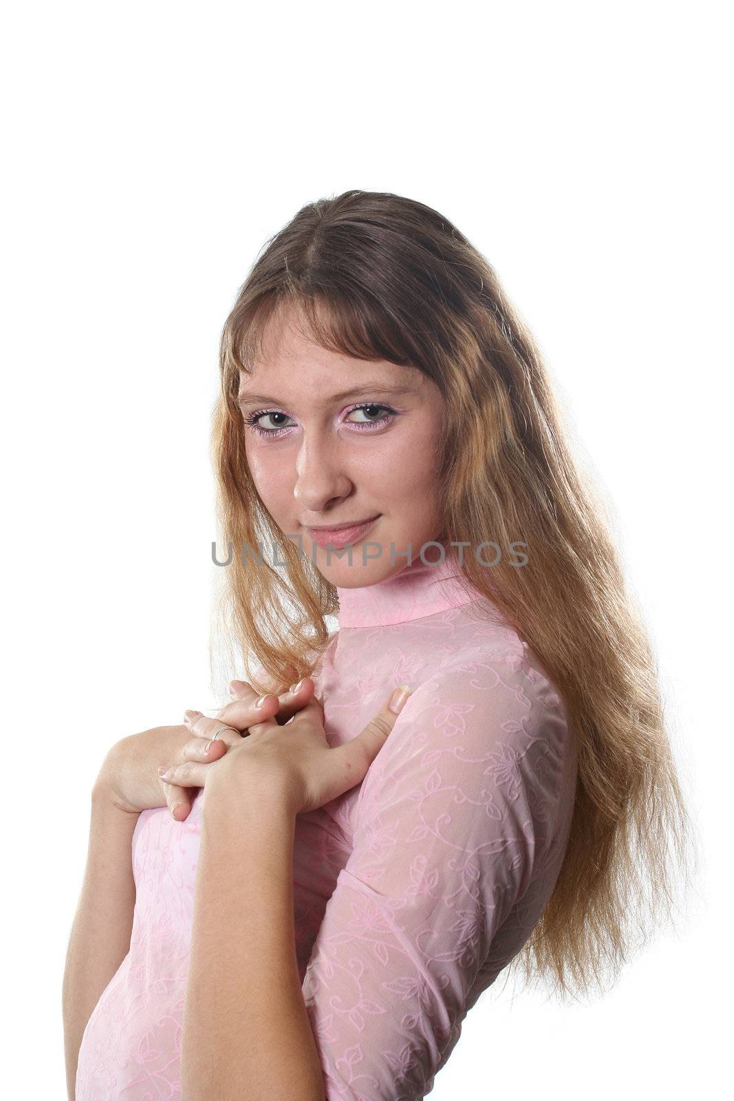 The long-haired girl poses on a white background