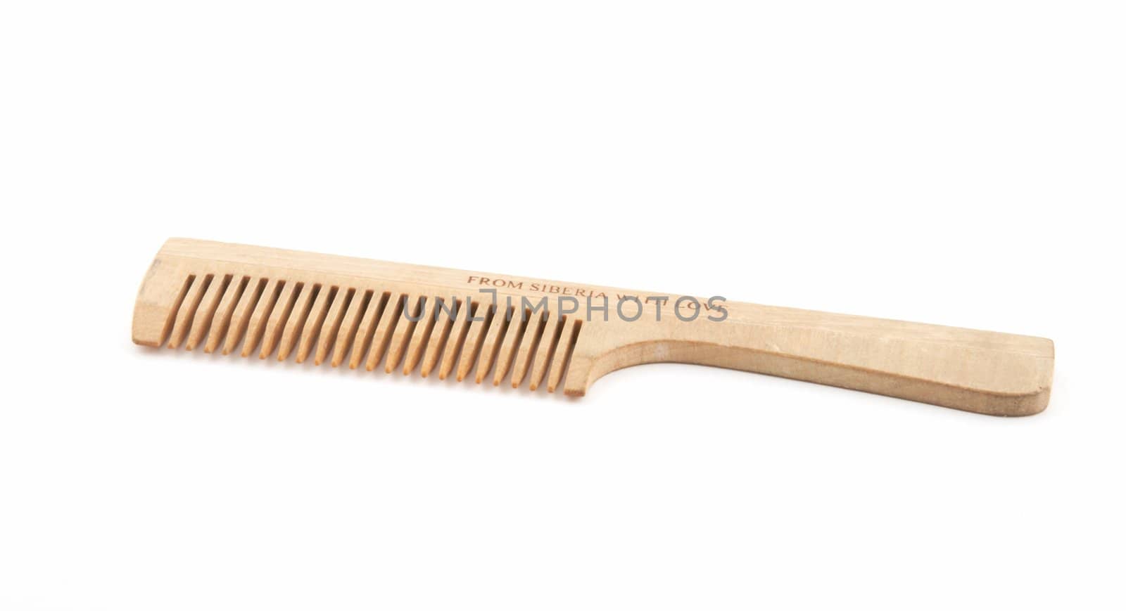 Wooden hairbrush on a white background