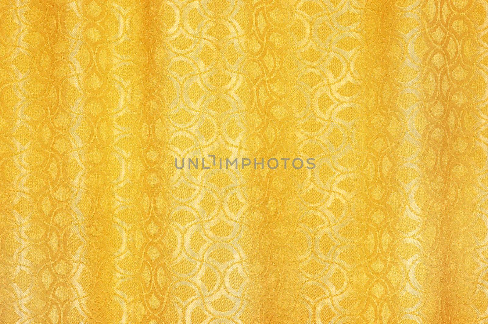 golden colored curtains textured background with ornaments