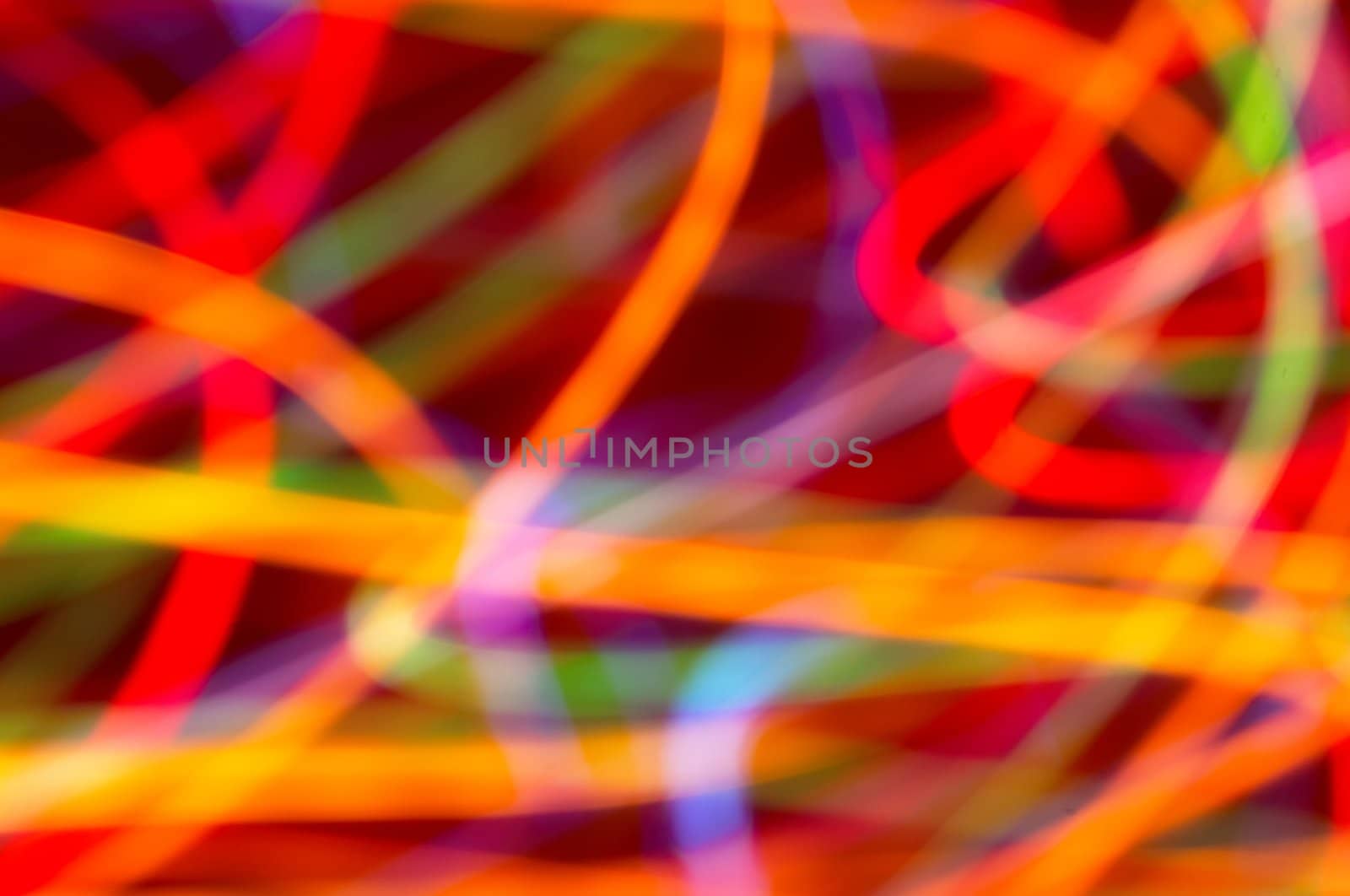abstract background: colored light motion blurs