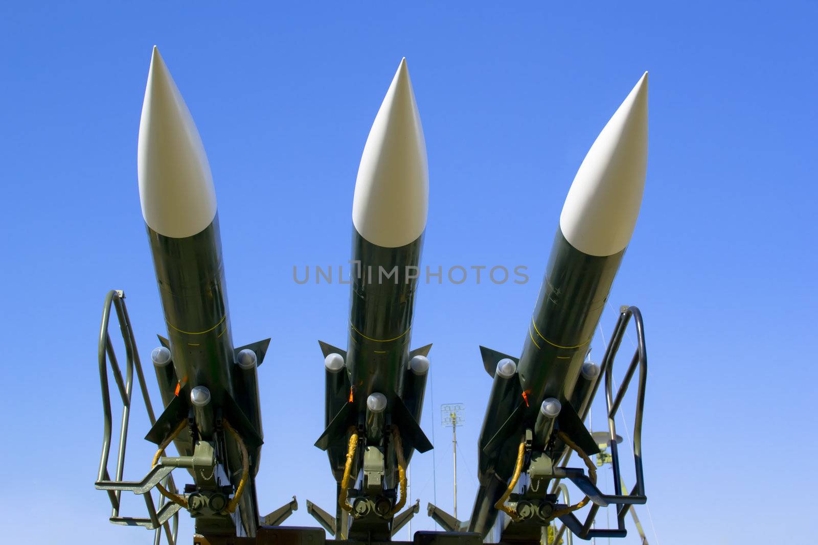 Several combat missiles aimed at the sky