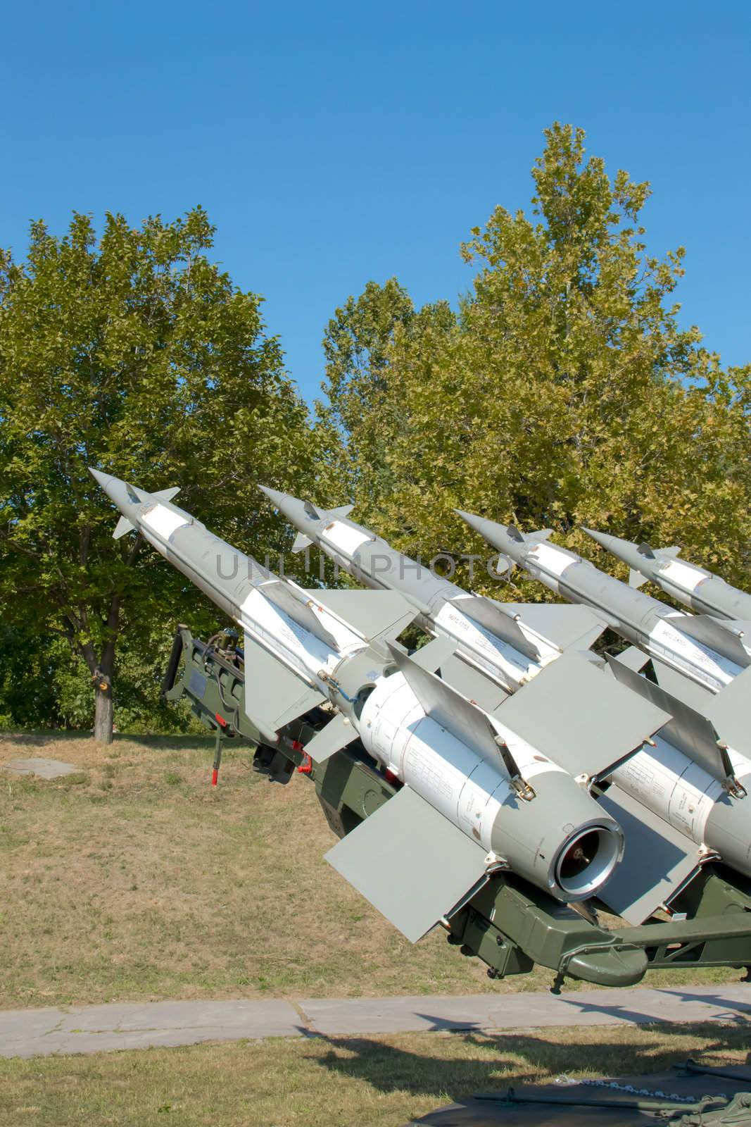 Several combat missiles aimed at the sky