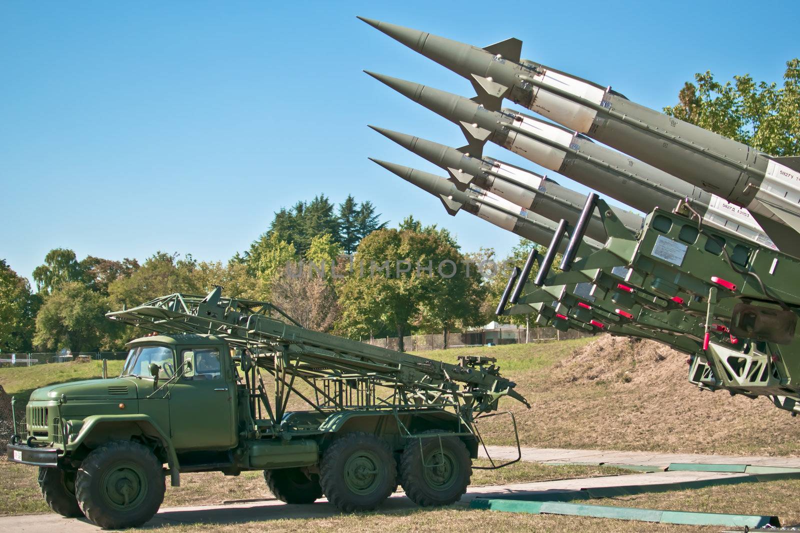 Several combat missiles aimed at the sky