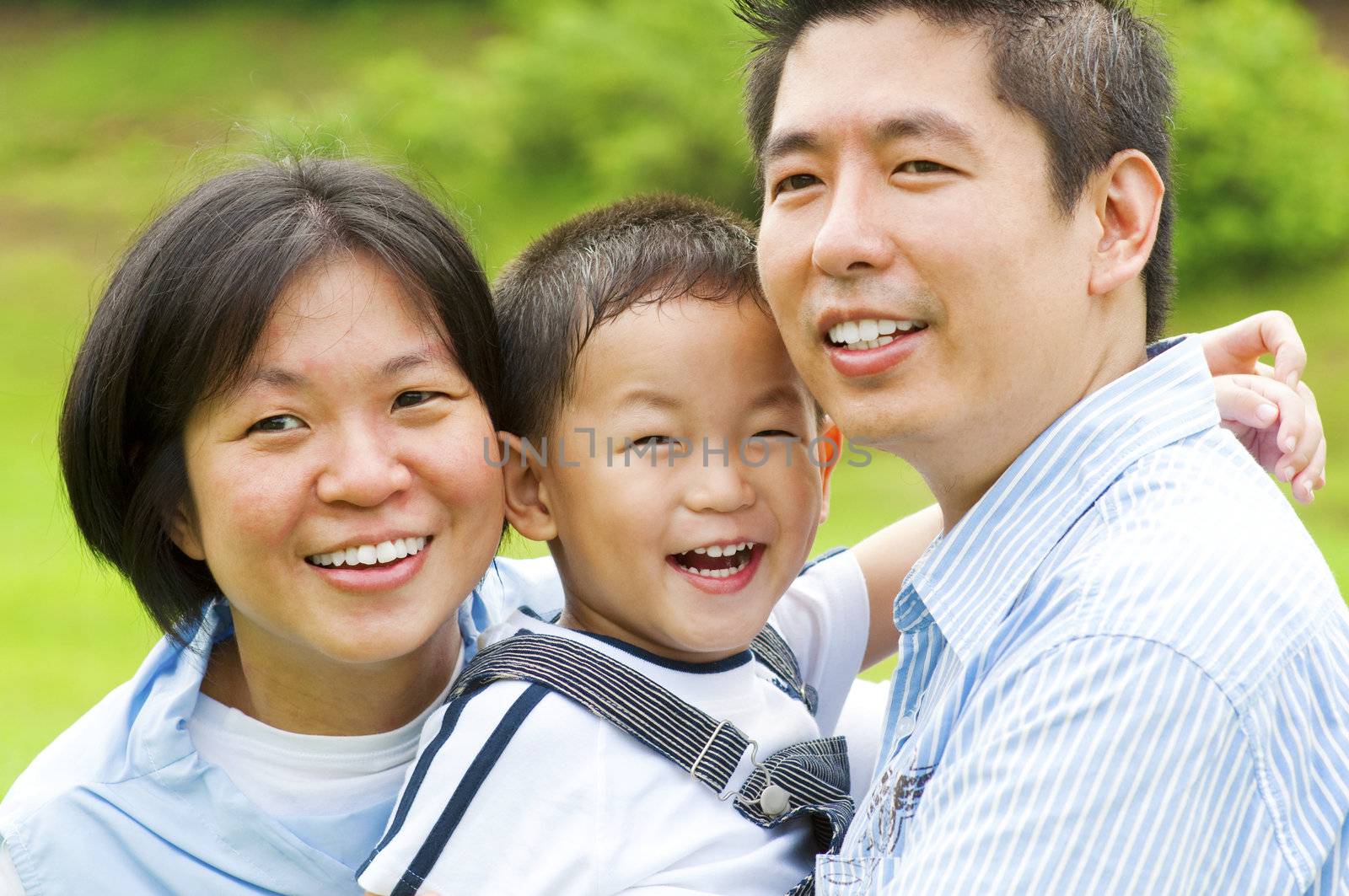 Happy Asian family at outdoors