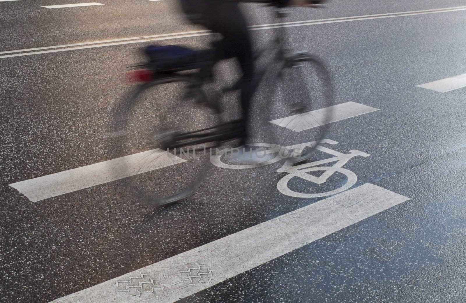 Cyclist in full speed after a heavy shower - Denmark.