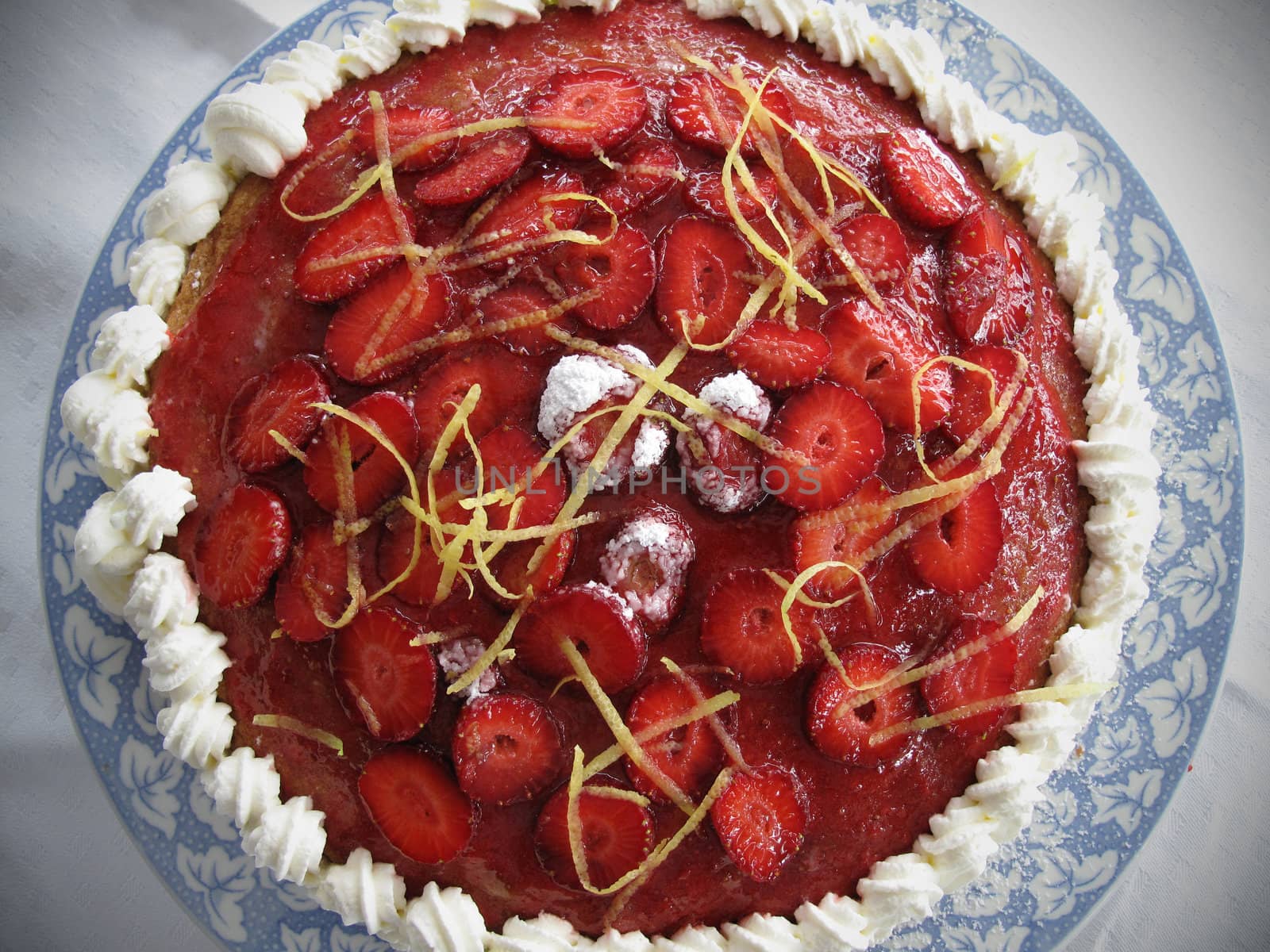 Nice strawberry cake on plate.