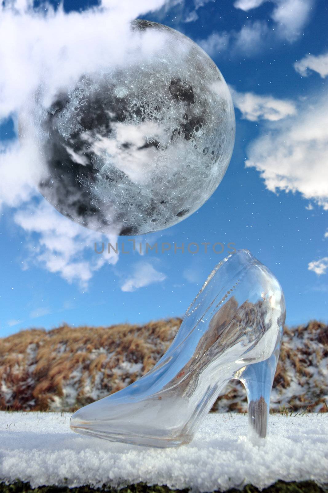 a glass slipper in a cloudy blue sky background with full moon at midnight