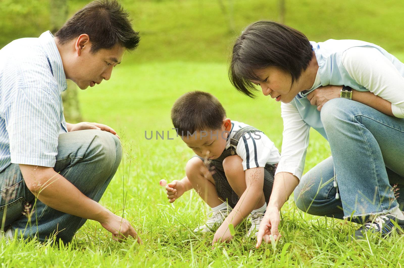 Candid Asian family at outdoors