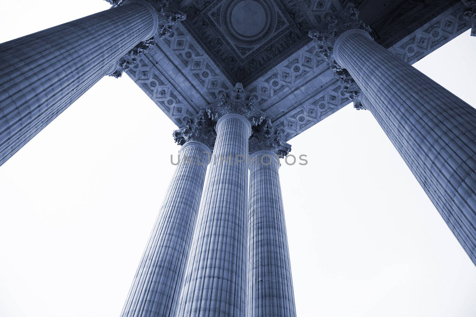 Columns of Pantheon - Paris seen from below. Pantheon was build by the architect Soufflot and among others Victor Hugo, Emile Zola and Voltaire are burried in the crypt.