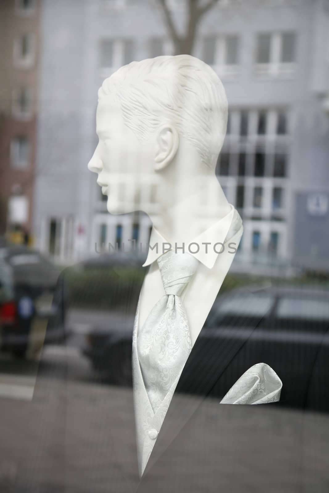 Gentleman fashion seen through a store window - Berlin , Germany