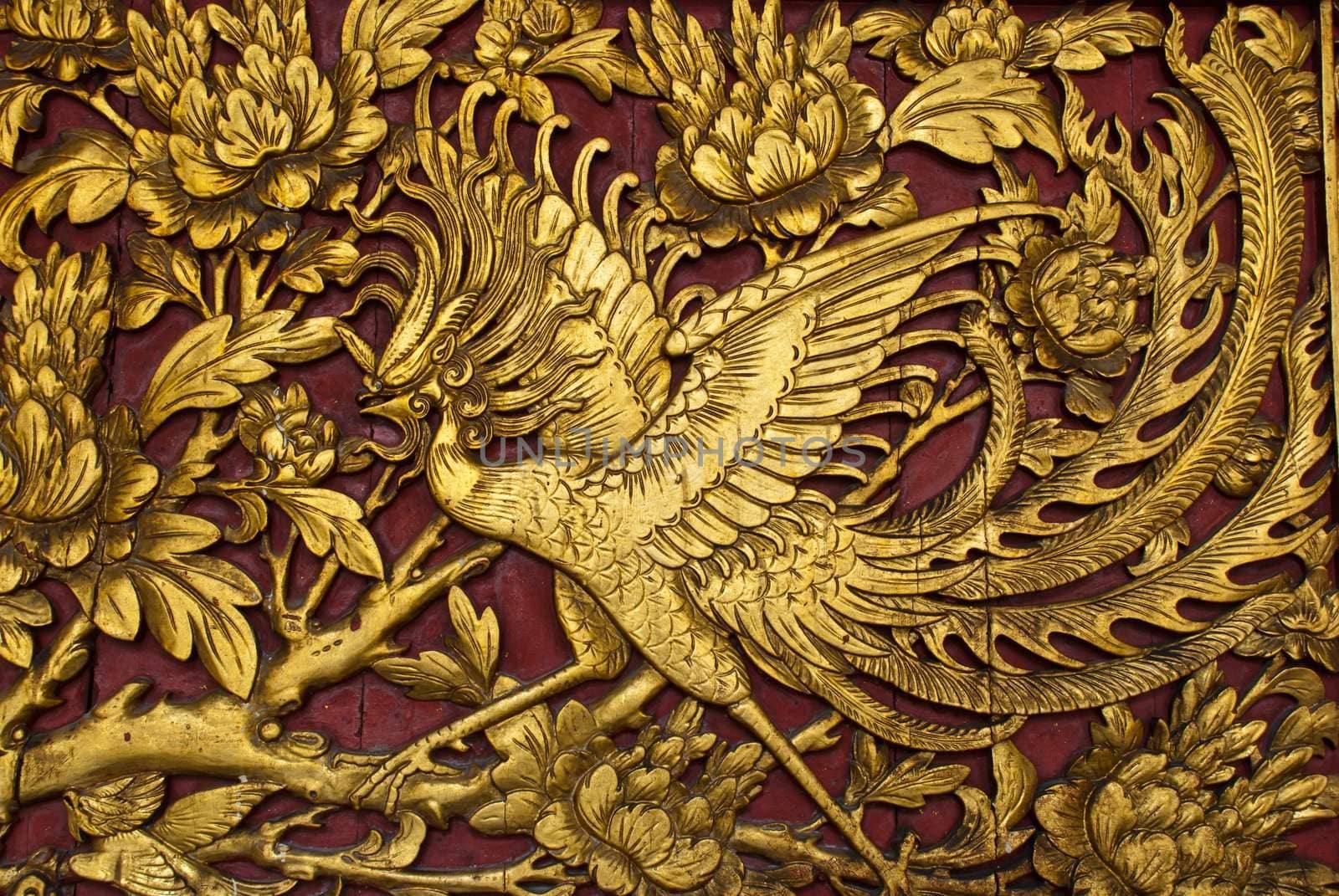 Old phenix golden plate, can be use for background, religion, life, and vilitality concepts
