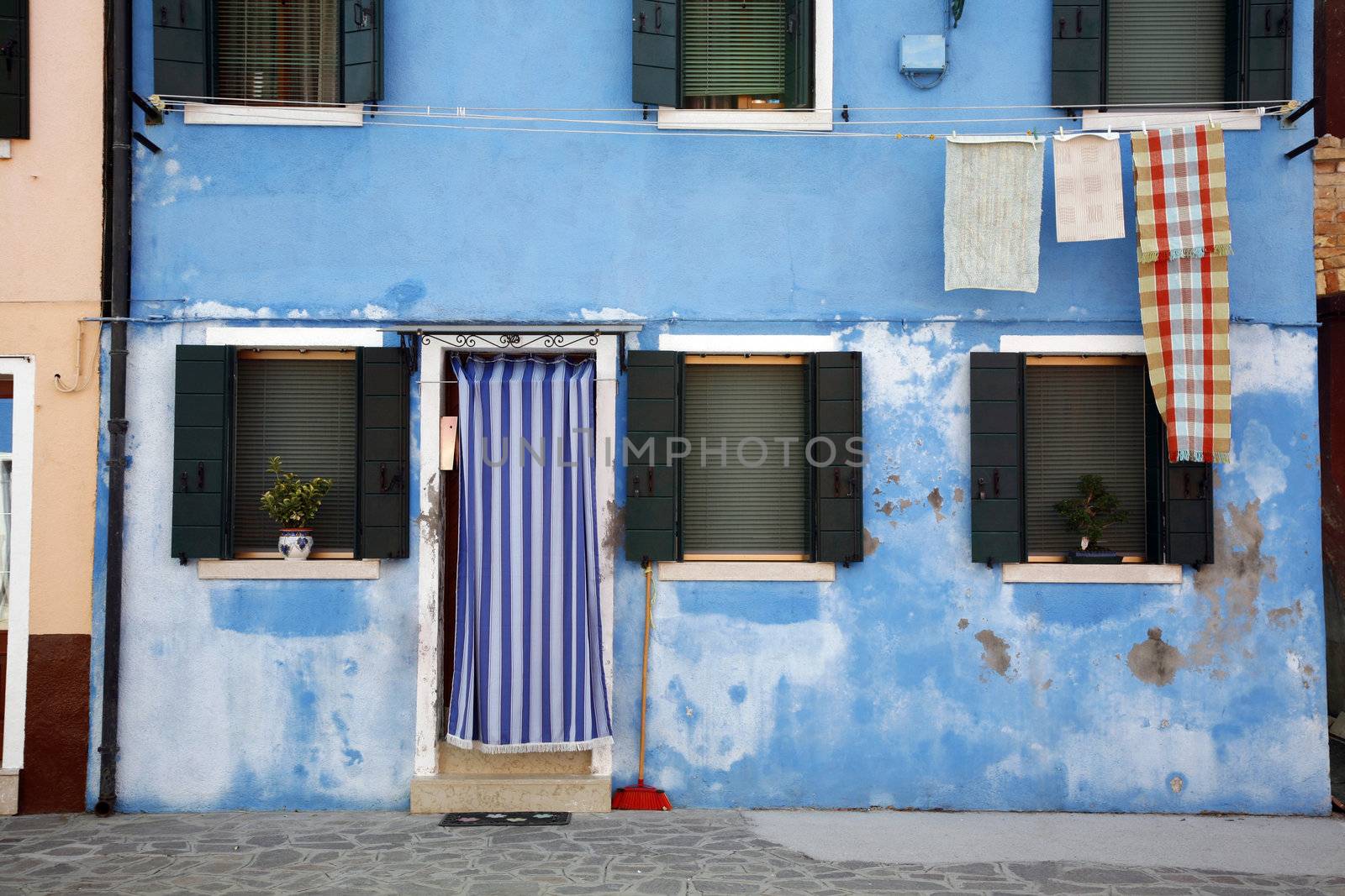 Colorful house on the island of Burano in the Venetian lagoon - Italy.