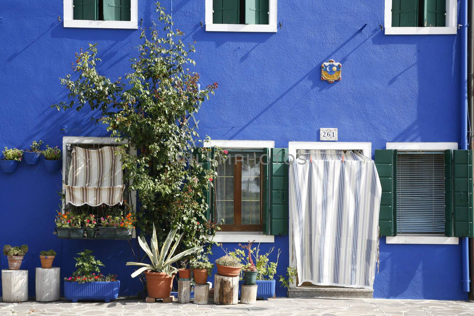 Colorful house on the island of Burano in the Venetian lagoon - Italy.