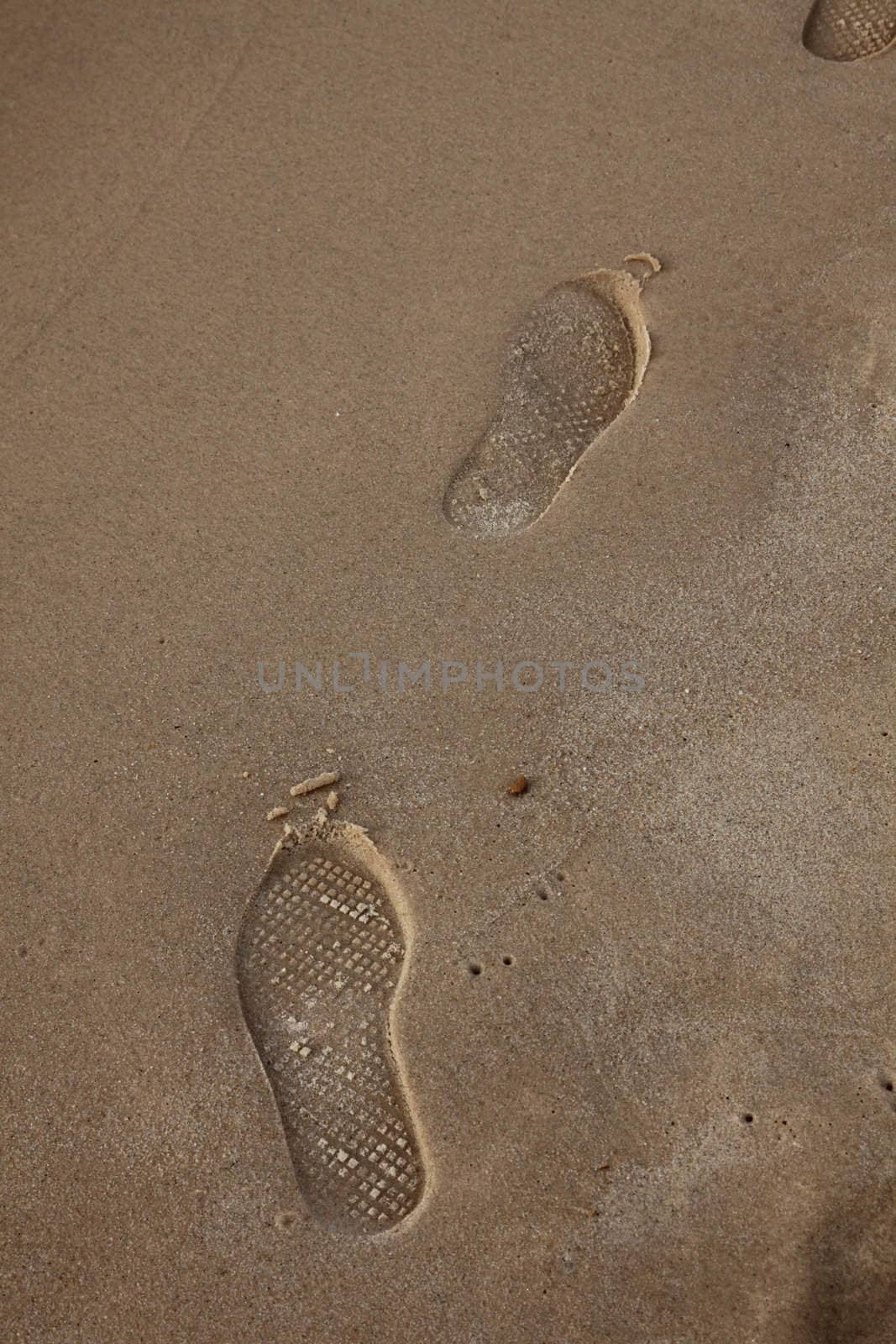 Human trace of a foot on sand