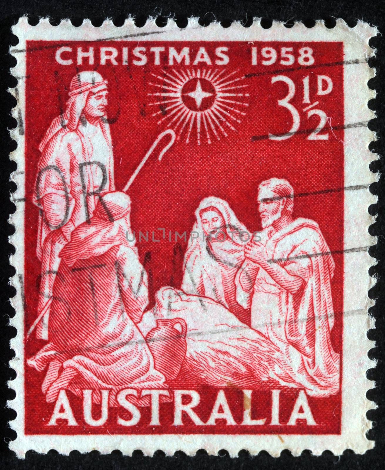 AUSTRALIA - CIRCA 1958 : A greeting Christmas stamp printed in Australia shows birth of Jesus Christ