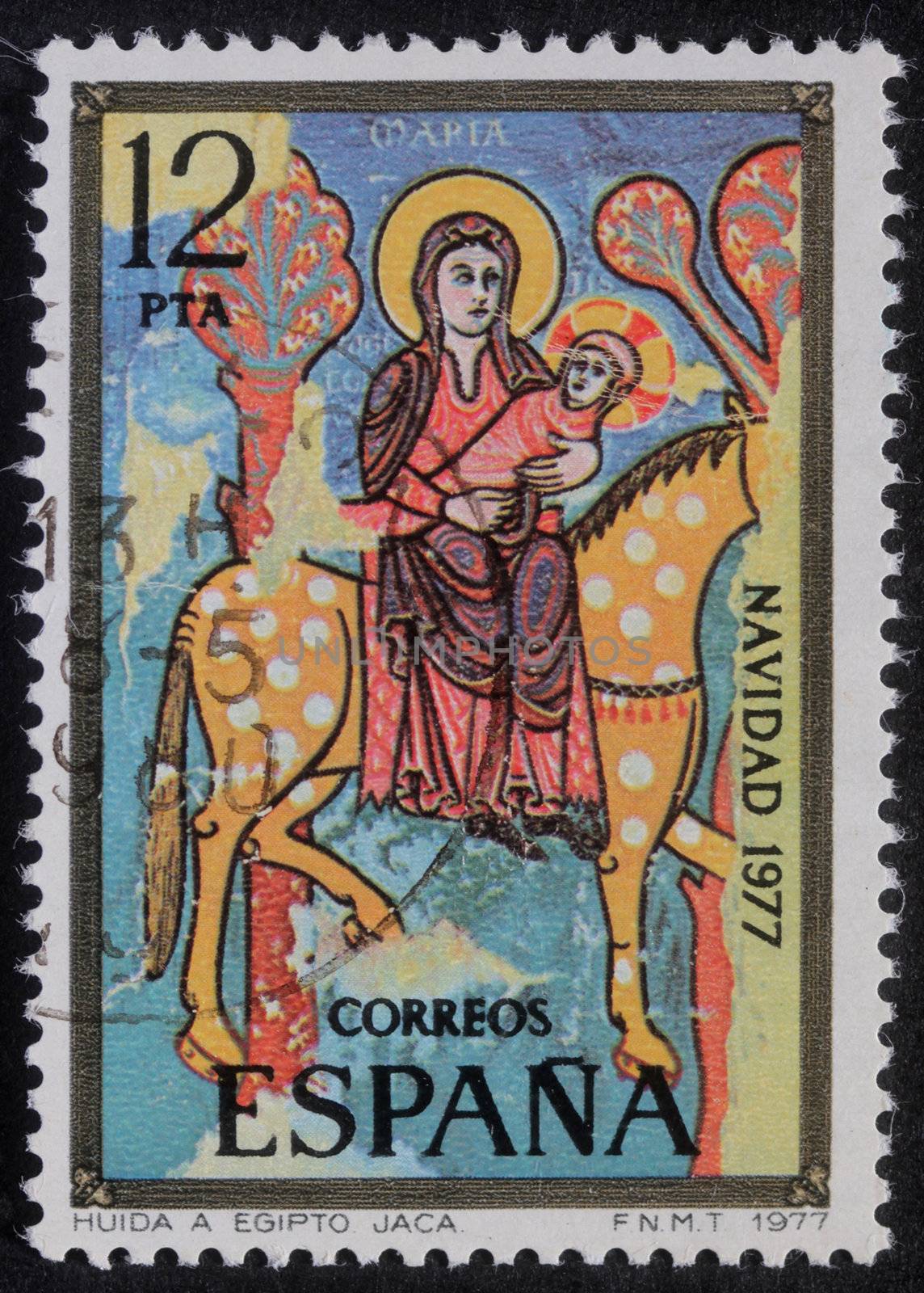 Spain - CIRCA 1977: A greeting Christmas stamp printed in Spain shows Flight to Egypt