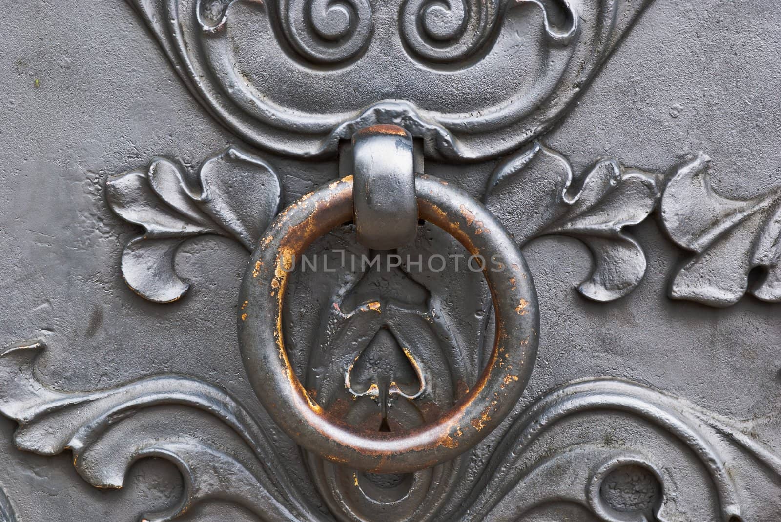 Closeup of metal door with metal door handle
 by sasilsolutions