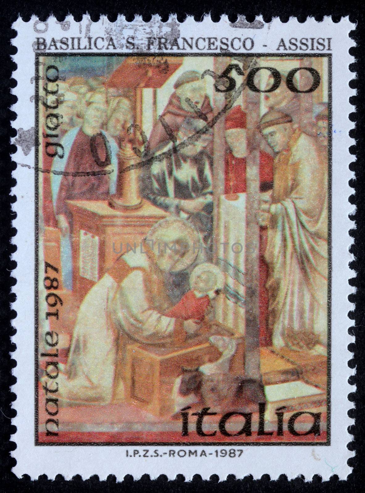 ITALY - CIRCA 1987: A greeting Christmas stamp printed in Italy shows draw by artist Giotto -  Birth of Jesus Christ