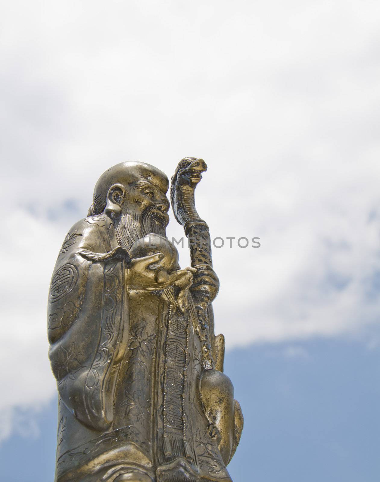 A image of Deity of Longevity with sky as background