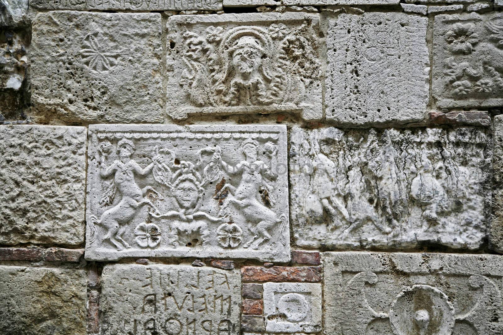 Ancient stone reliefs seen in Montepulciano - Tuscany - Italy.