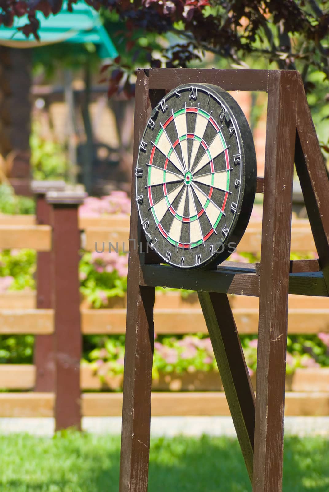 dart board standing in a city park