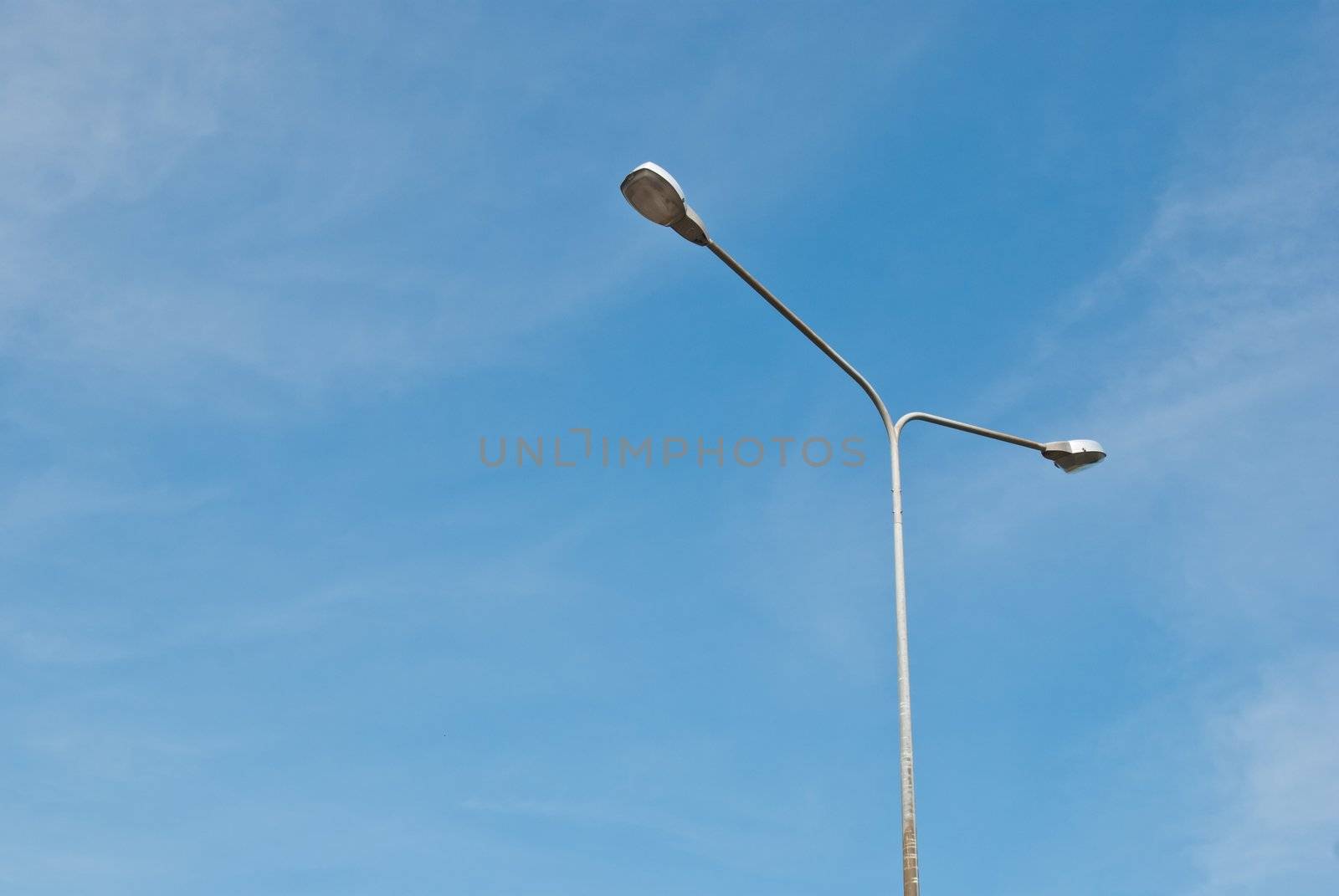 Street light pole on a sunny day
 by sasilsolutions