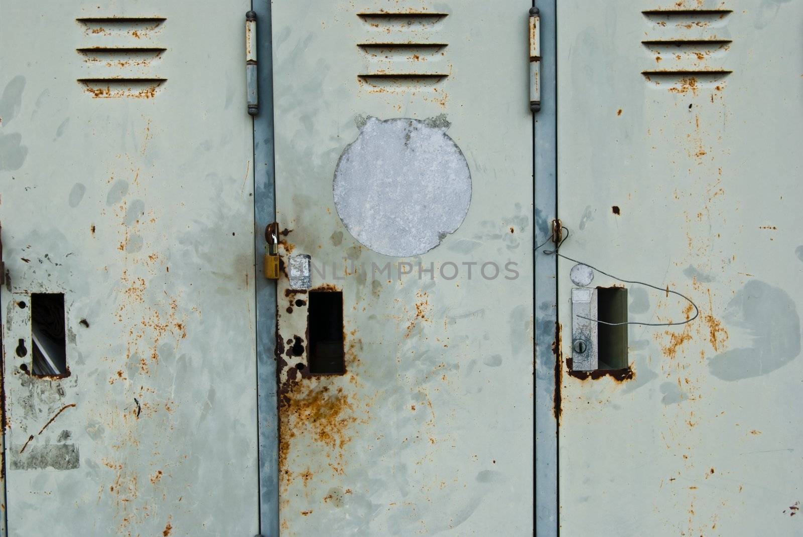 Old rusty metal lockers background
