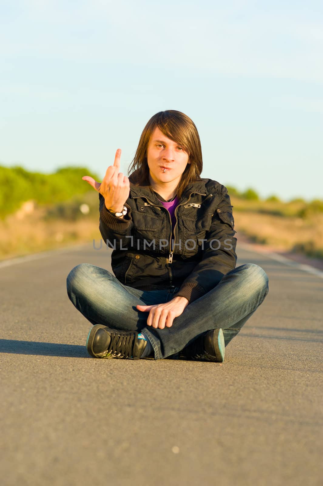 Young male demonstrating and showing his displeasure