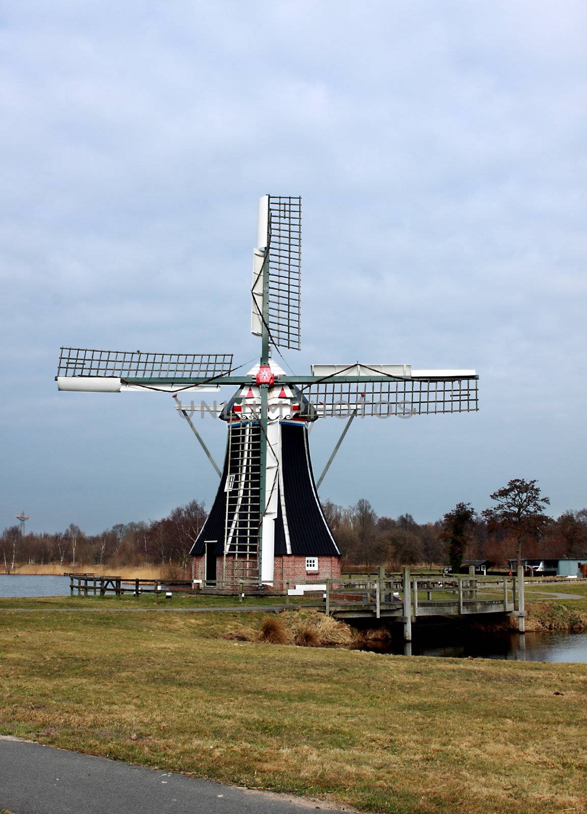 windmill on the lakeshore in the Netherlands