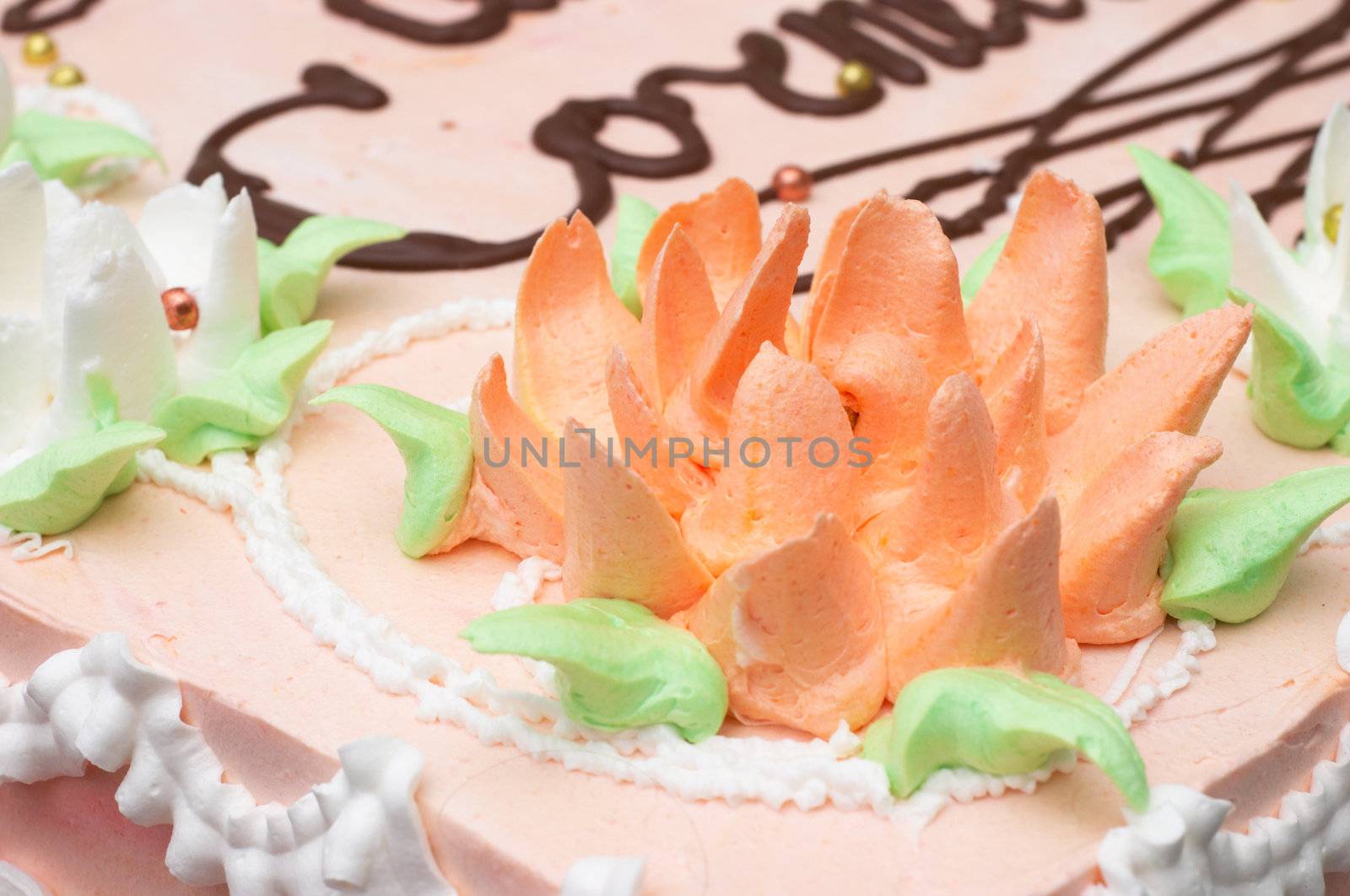 flourish multi-colored cream decoration on cake