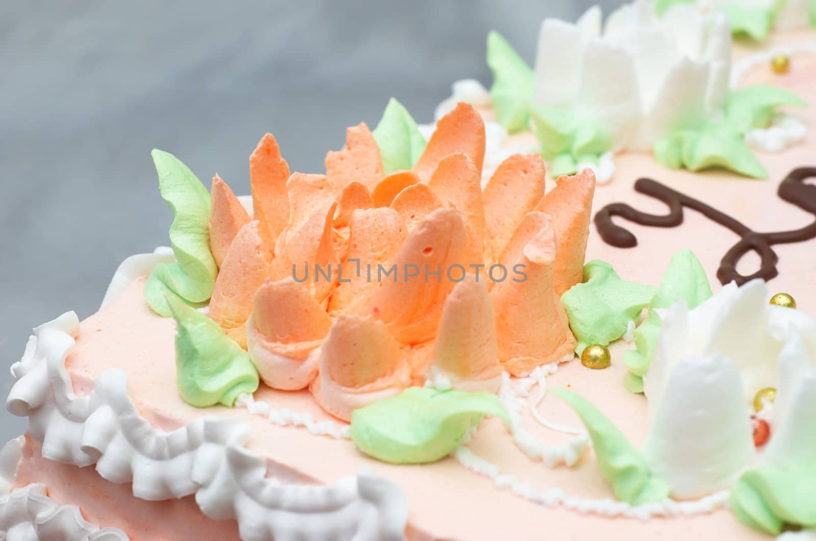 flourish multi-colored cream decoration on cake