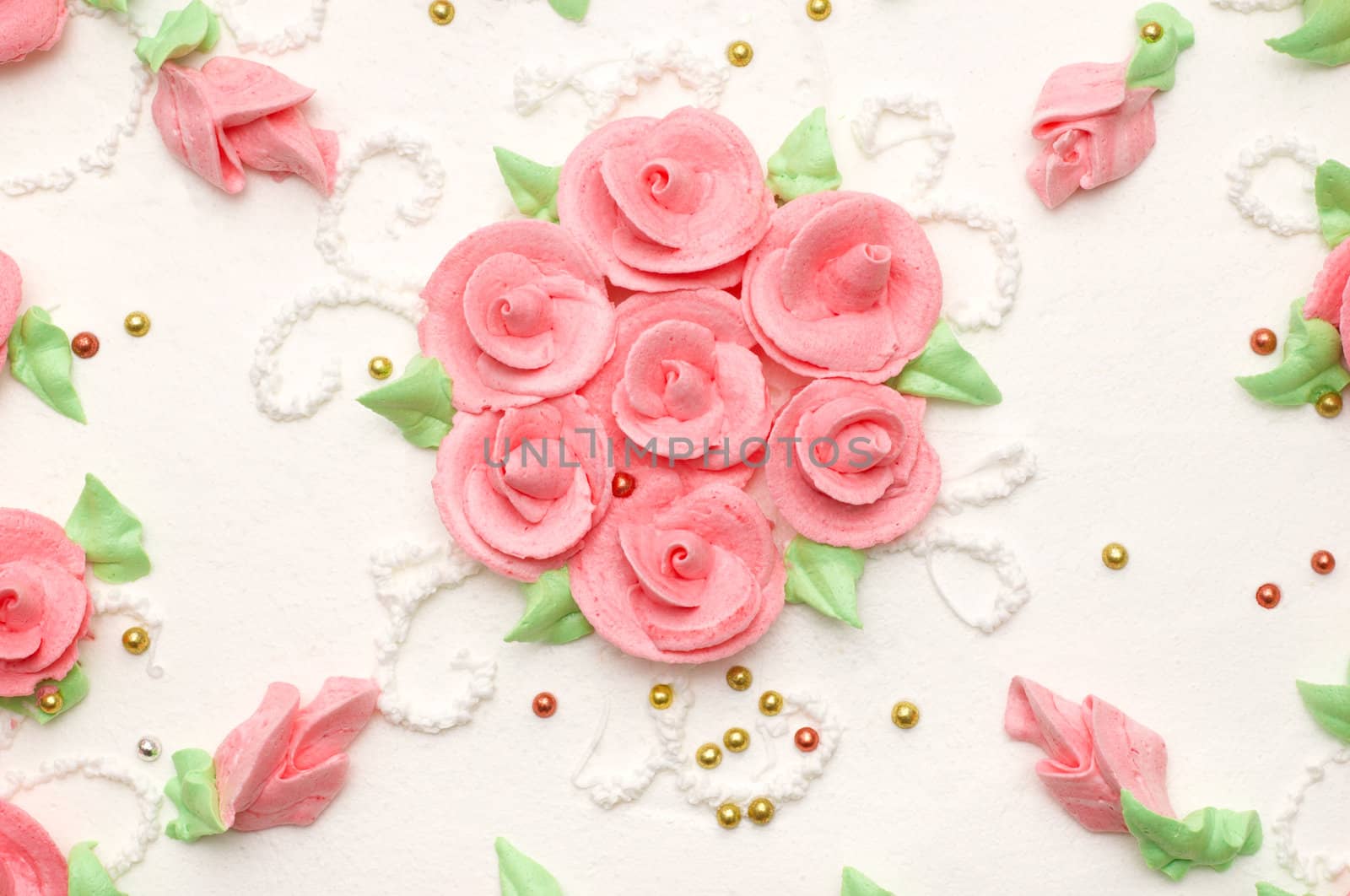 creamy cake decorated with roses. suitable as background.