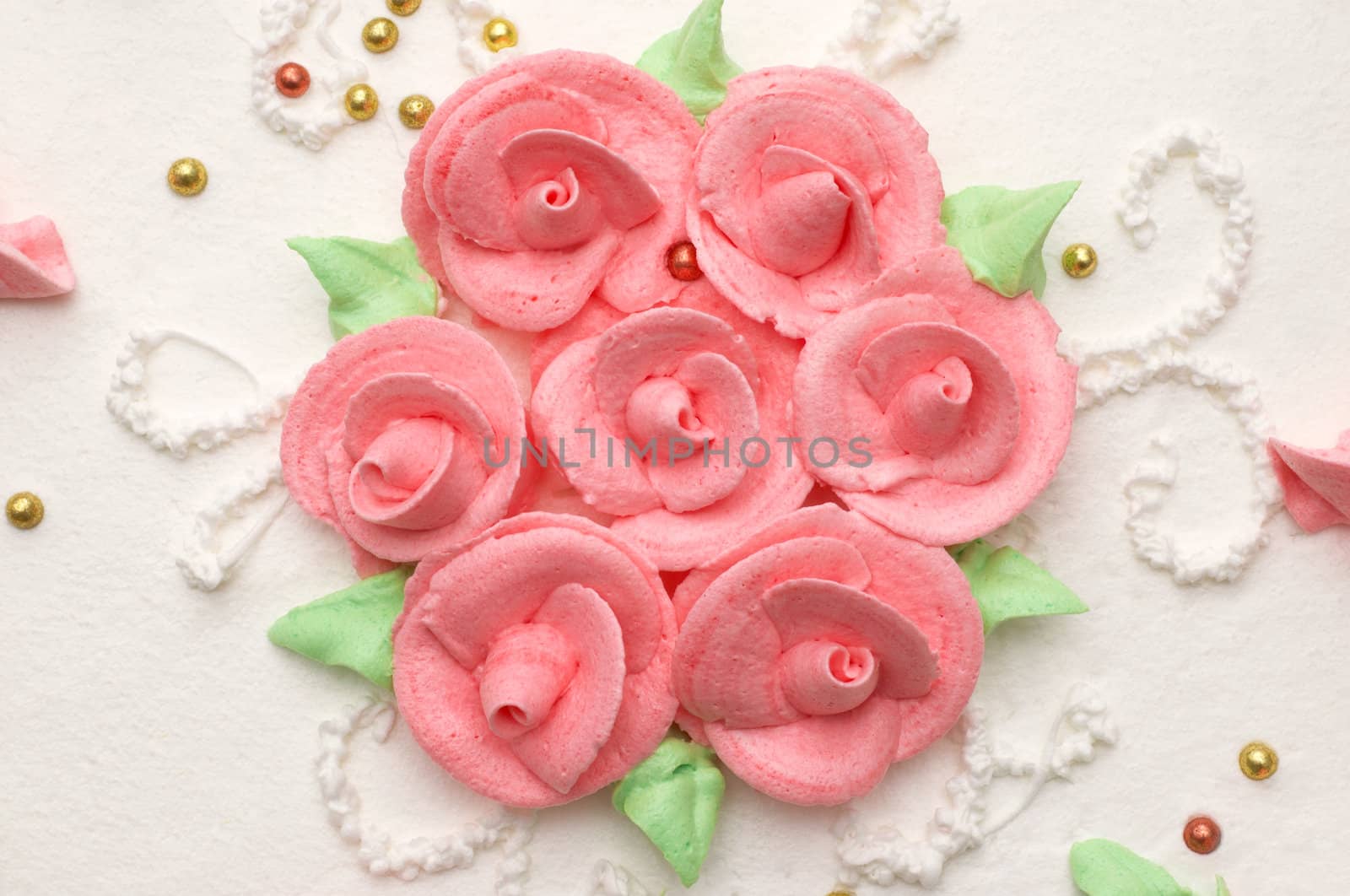 creamy cake decorated with roses. suitable as background.