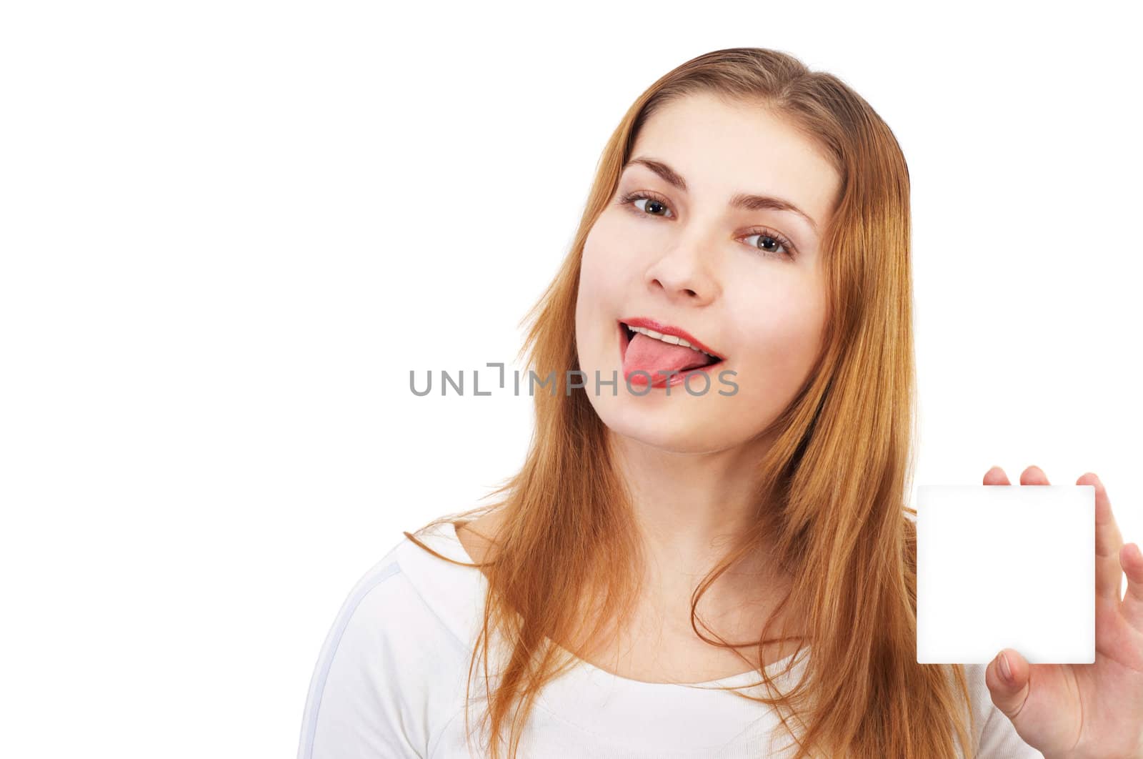 Pretty girl in white shows the tongue and empty white card