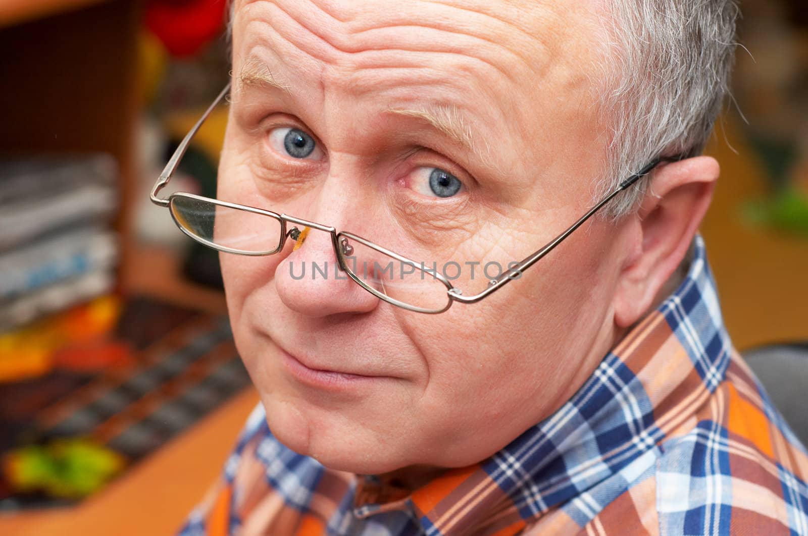Casual senior man with glasses. emotional portrait series.