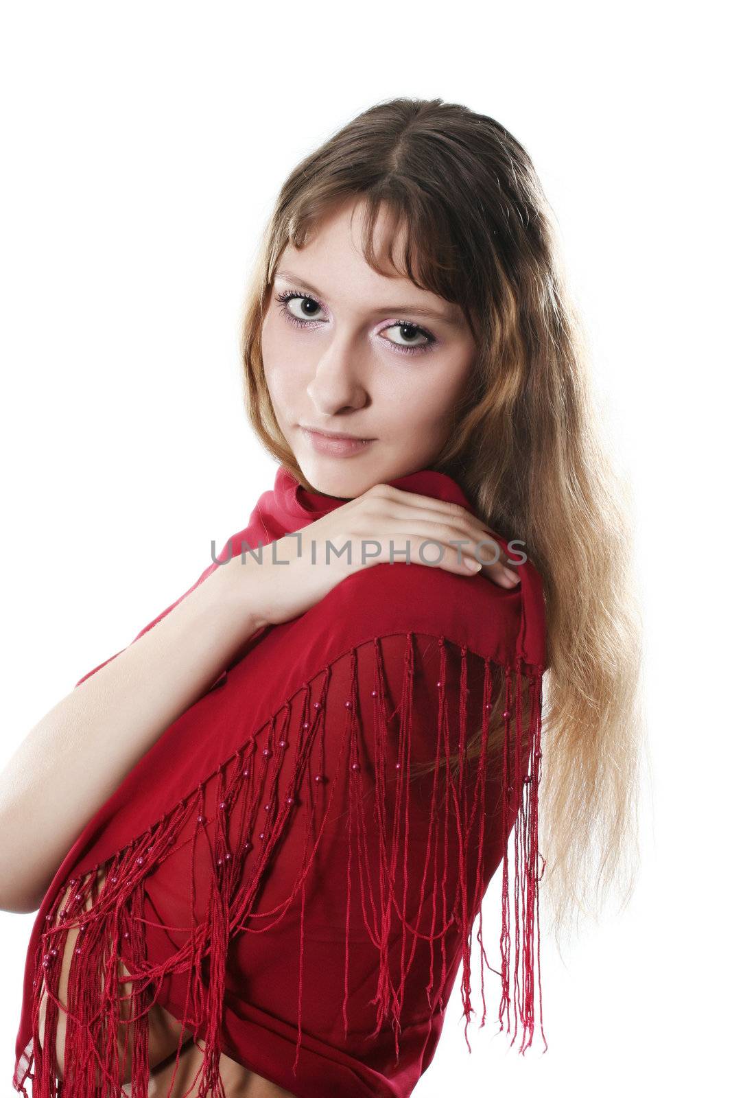 The young attractive girl poses on a white background